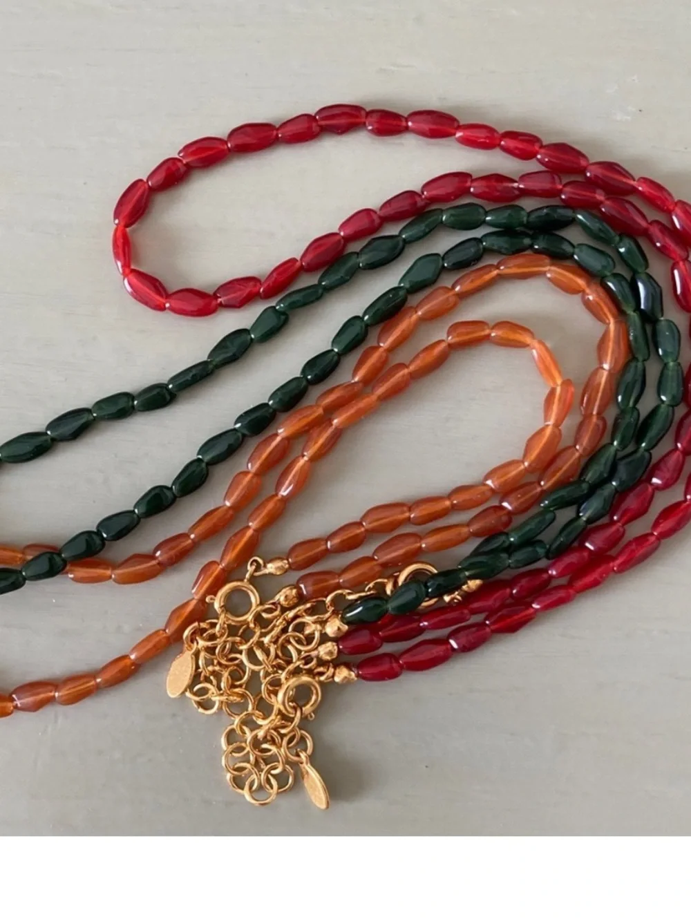 Sezane Flora Earrings, Amandine Bracelet and Clem Necklace
Color: Carmine Red - Picture 9 of 14